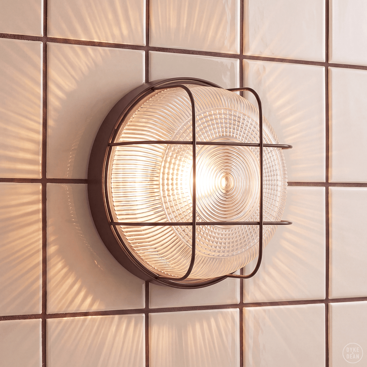 BROWN CAGED INDUSTRIAL ROUND WALL & CEILING BULKHEAD LIGHT - DYKE & DEAN