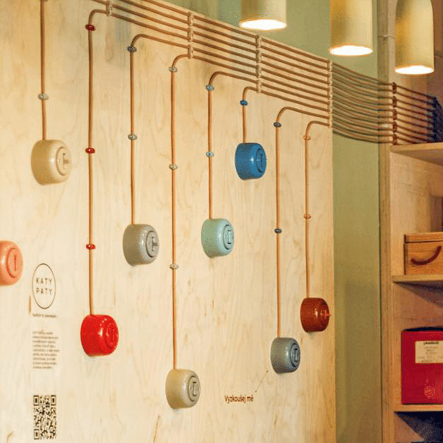 PORCELAIN KATY PATY COLONA ROUND SURFACE MOUNTED DOUBLE SLIM BUTTON SWITCH BRICK RED - DYKE & DEAN