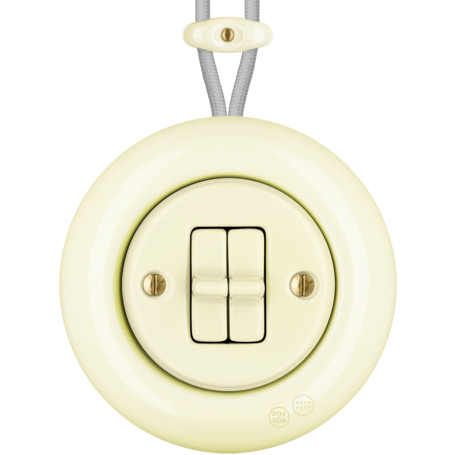 PORCELAIN KATY PATY COLONA ROUND SURFACE MOUNTED DOUBLE TOGGLE BUTTON SWITCH VANILLA - DYKE & DEAN