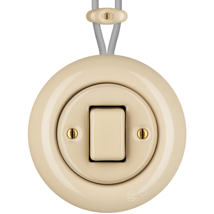 PORCELAIN KATY PATY COLONA ROUND SURFACE MOUNTED FAT BUTTON SWITCH SAND - DYKE & DEAN