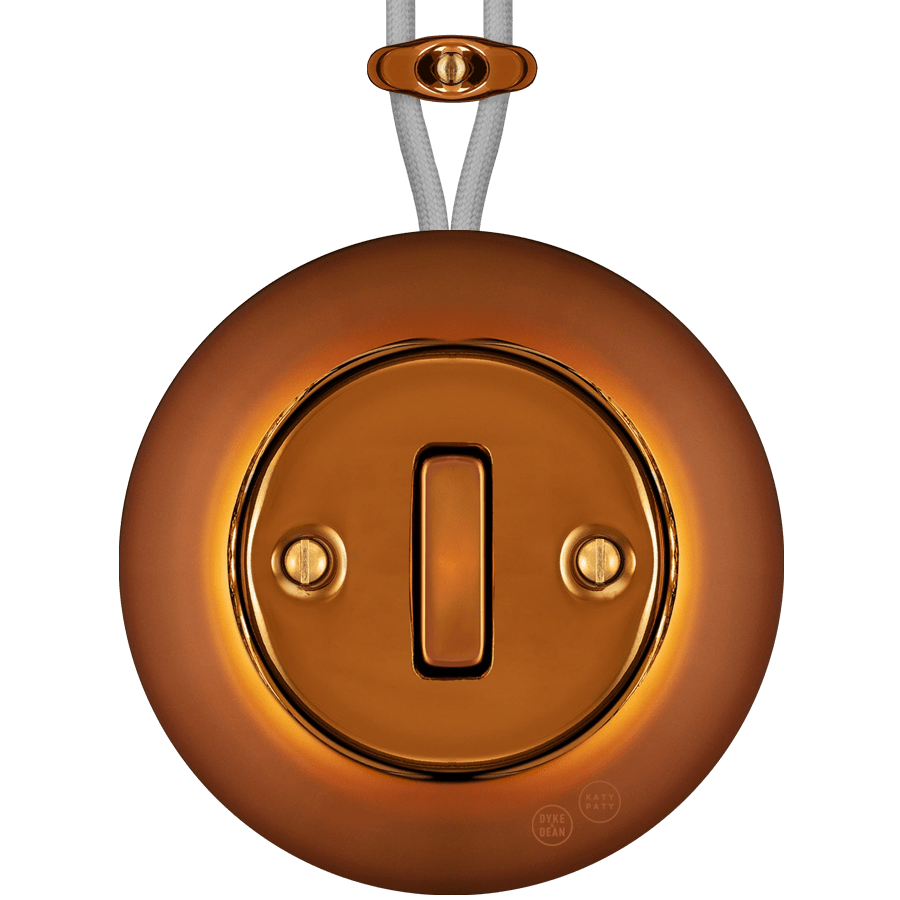 PORCELAIN KATY PATY COLONA ROUND SURFACE MOUNTED SLIM BUTTON SWITCH BRONZE - DYKE & DEAN