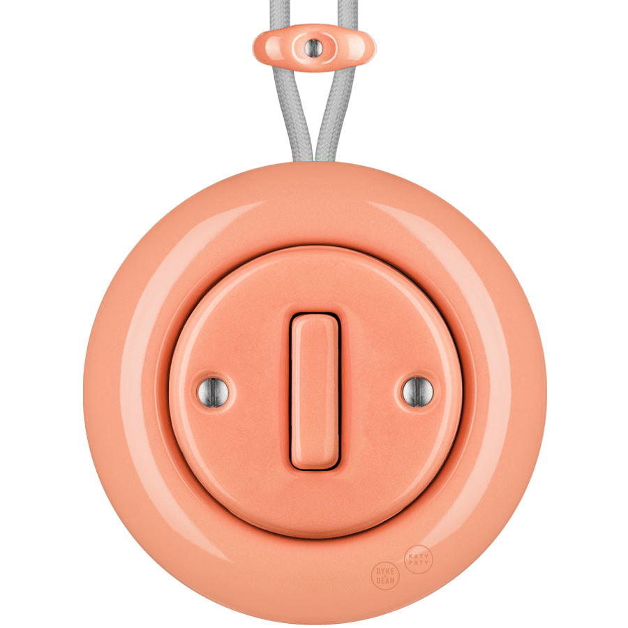 PORCELAIN KATY PATY COLONA ROUND SURFACE MOUNTED SLIM BUTTON SWITCH SALMON PINK - DYKE & DEAN