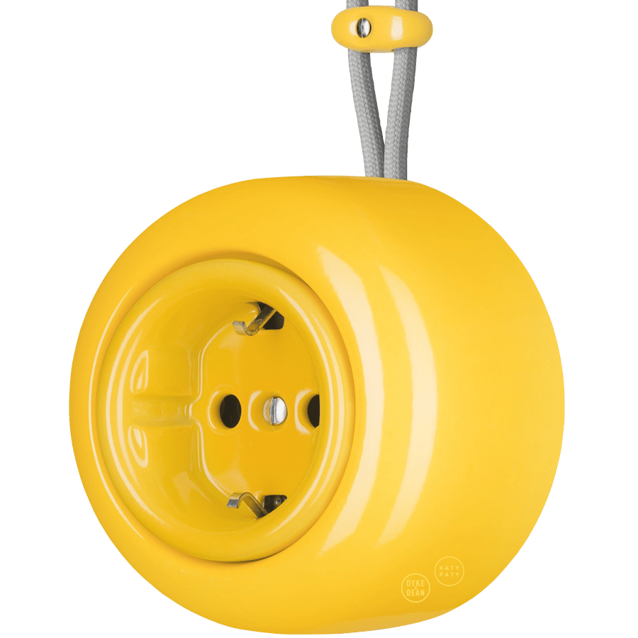 PORCELAIN ROUND SURFACE MOUNTED SCHUKO SOCKET YELLOW - DYKE & DEAN