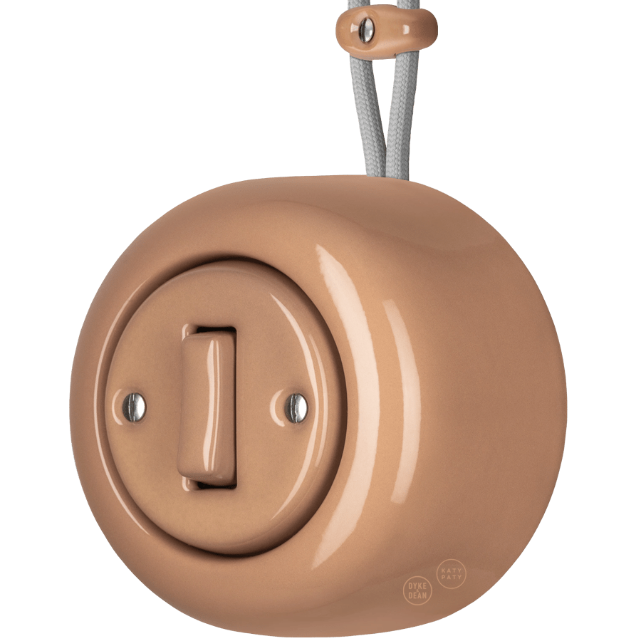 PORCELAIN ROUND SURFACE MOUNTED SLIM BUTTON SWITCH DERMA - DYKE & DEAN