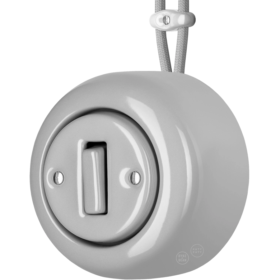 PORCELAIN ROUND SURFACE MOUNTED SLIM BUTTON SWITCH GREY - DYKE & DEAN