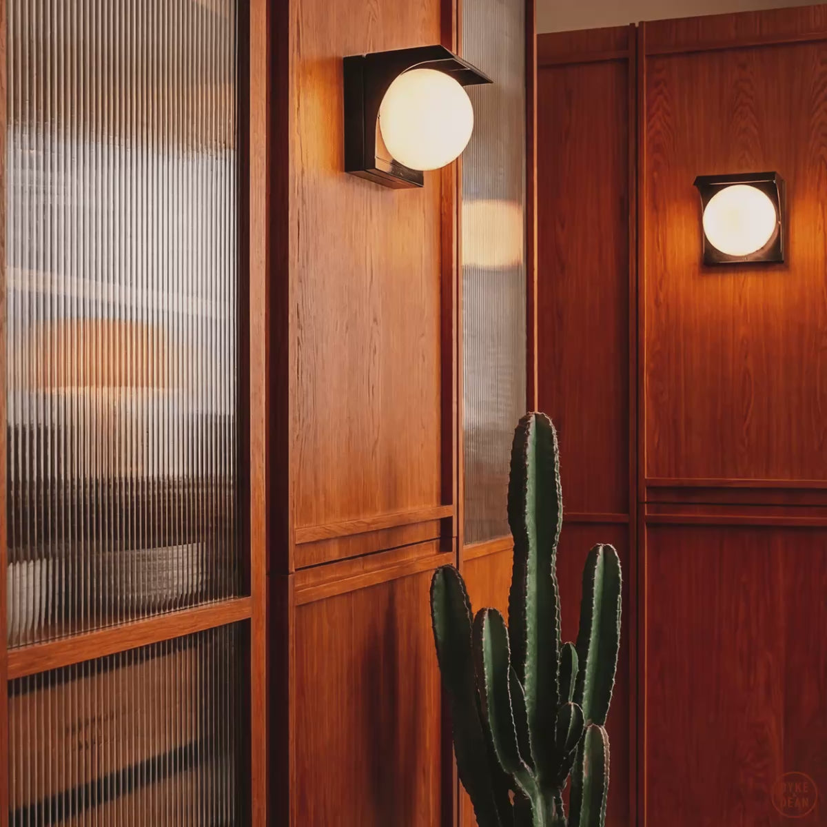 A selection of Dyke & Dean lighting products in various context shot.