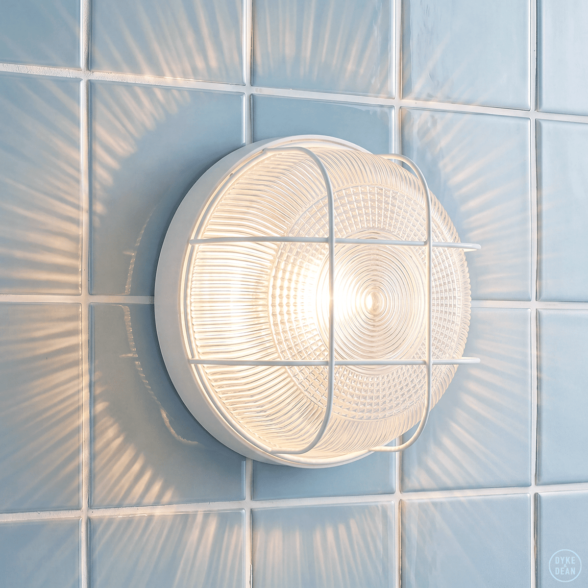 WHITE CAGED INDUSTRIAL ROUND WALL & CEILING BULKHEAD LIGHT - DYKE & DEAN