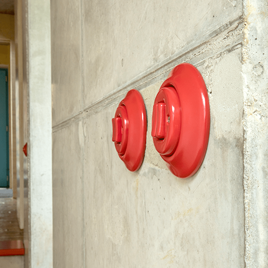 PORCELAIN WALL LIGHT SWITCH RED FAT BUTTON - DYKE & DEAN