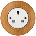 Fagus UK socket by Katy Paty with white porcelain centre and solid beech surround